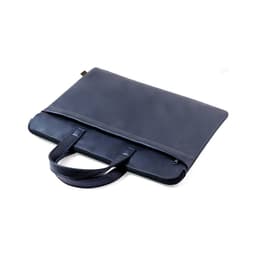 A navy bag with handles and a smooth exterior, featuring a zip closure and a logo.