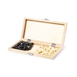 A wooden box containing black and white chess pieces, fully organised and ready for play.
