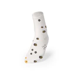 A white sock featuring a pattern of bees and flowers in black and yellow tones, with a logo on the cuff.