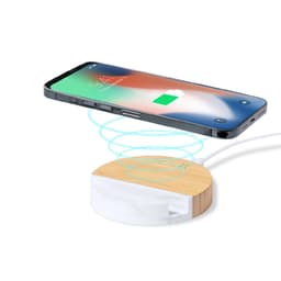A wireless charger holder featuring a wooden base and a white underside, with a smartphone charging above it.