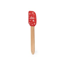 A red spatula with a wooden handle, featuring a festive design of snowflakes and "Merry Christmas."