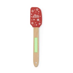 A red spatula with a wooden handle, featuring a festive design and a green section on the handle.