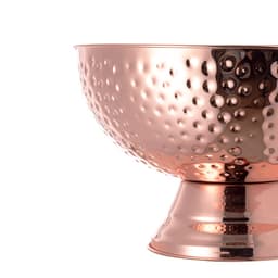 A copper ice bucket with a hammered finish, featuring a smooth base and reflective surface.