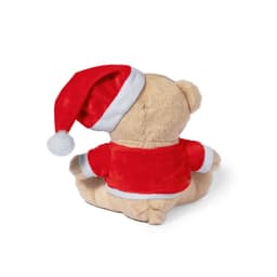 A plush teddy bear wearing a red and white Santa outfit and hat, facing away from the viewer.