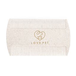 A pet grooming comb in cream colour with a gold logo, designed for easy detangling.