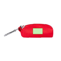 A red waste bag dispenser with a small green label and a metal clip for attachment.