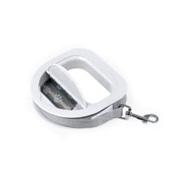 A grey pet lead with a white handle and a retractable design, featuring a paw print pattern on the tape.