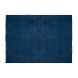 A navy blue blanket with a smooth texture, featuring a simple design and a branding logo.