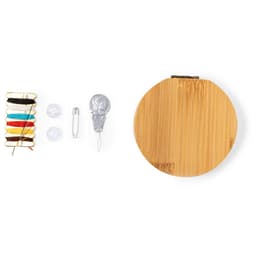 A sewing kit featuring colourful threads, buttons, a safety pin, and a circular bamboo case.