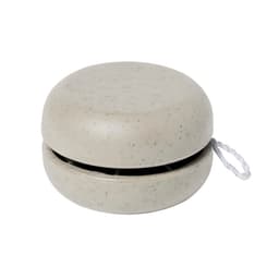 A cream-coloured yo-yo with a textured surface and a string for play. It features a branding logo on the side.