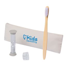 A bamboo toothbrush, hourglass timer, two dental guards, and a cream pouch featuring a logo.