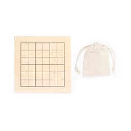 A wooden Sudoku grid with 25 empty squares, accompanied by a small cream fabric bag.