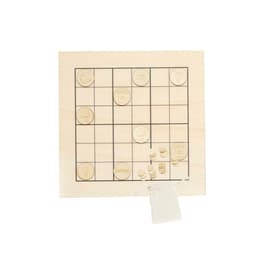 A wooden Sudoku game board with engraved icons and a small pouch of wooden game pieces.