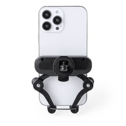 A black car phone holder designed to securely grip a white smartphone. It features adjustable arms for stability.
