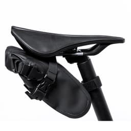 A black bike saddle with a mounted black bag attached to the underside, featuring straps for secure fastening.