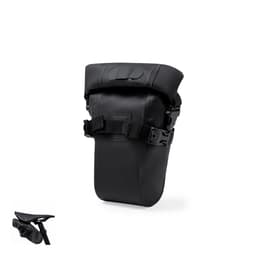 A black waterproof bag with a strap, designed for attaching to a bike seat. It features a simple closure and sturdy construction.