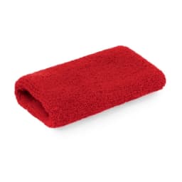 A red fluffy towel folded neatly. The product has a soft texture and a rectangular shape.