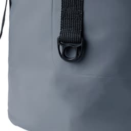 A grey dry bag featuring a textured strap and a buckle attachment for secure closure.