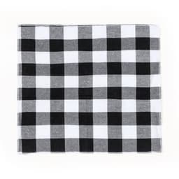 A black and white checkered picnic blanket featuring alternating squares of solid black and grey.