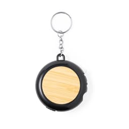 A black multi-tool tape measure with a bamboo surface and a keyring attachment.