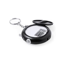A black multi-tool with a keyring, featuring various screwdriver bits inside a circular case.