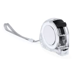 A clear tape measure with a black button and a wrist strap. Features a round design for easy handling.