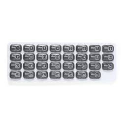 A pill organiser with compartments labelled from "day 1" to "day 31," featuring a sleek black and white design.