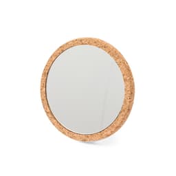 A round mirror with a natural cork frame, featuring a simple and minimalistic design.