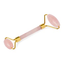 A pink jade facial roller with gold accents, featuring two rounded ends for skincare use.