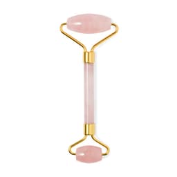 A pink jade facial roller with gold accents, featuring two oval ends for beauty applications.