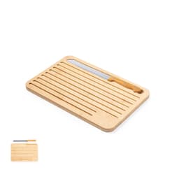 A bamboo chopping board with grooves, featuring a wooden handle knife positioned on it.