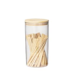 A clear container with a bamboo lid filled with wooden cutlery pieces in a light colour.