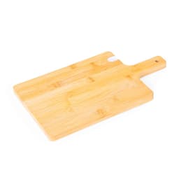 A bamboo chopping board in a rectangular shape with a handle and a small curved cutout. It has a natural finish.