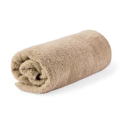 A rolled, soft hand towel in a sandy beige colour with a textured surface. It features a logo.