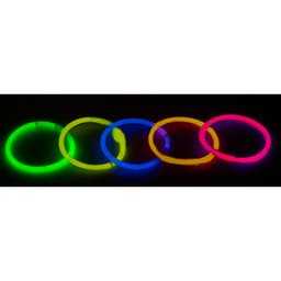 Glowing novelty bracelets in green, blue, yellow, pink, and orange arranged in a row against a dark background.