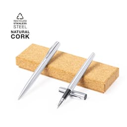 A pen set featuring two metal pens in silver, displayed on a natural cork base. The set has a logo.