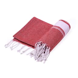 A red and white towel with fringed edges, neatly rolled up for storage or display. It features a simple striped design.