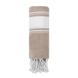 A soft beige towel with white stripes and tassels, featuring a simple design and a logo.