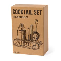 A bamboo cocktail set in a cardboard box, featuring a shaker, stirring spoon, and various bar tools.