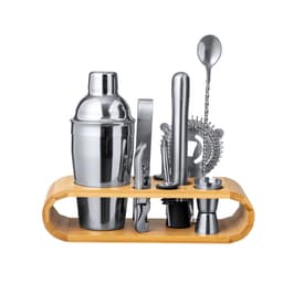 A stylish cocktail set with a stainless steel shaker, tools, and a bamboo stand, featuring sleek metallic finishes.