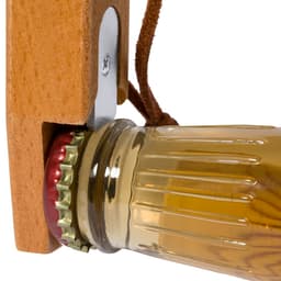 A drink bottle opener with a wooden handle, featuring a metallic opener and a bottle cap in red and gold.