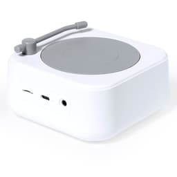 A white Bluetooth speaker with a grey circular top and a small lever, featuring ports on the side.