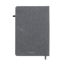 A grey notebook with a textured cover, featuring a bookmark ribbon and a logo on the front.