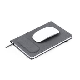 A grey notebook with an attached grey mouse pad and a white computer mouse resting on top.