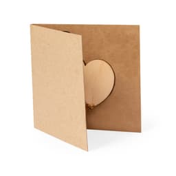 A brown card with a heart-shaped cutout, revealing a natural wooden heart inside. Features a simple design and a logo.