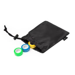 A black drawstring pouch containing three colourful rings: blue, green, and yellow. The pouch has a small logo.