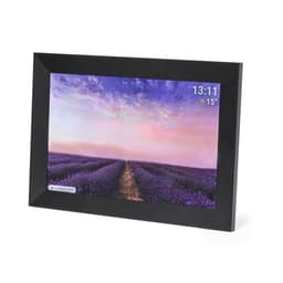 A black digital photo frame displaying a scenic lavender field under a pastel sky with time and temperature indicators.