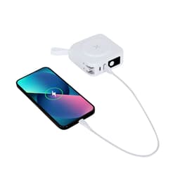 A white travel cable adapter is connected to a smartphone, providing charging capabilities.