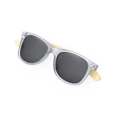 A pair of sunglasses with a clear frame and dark lenses, featuring wooden arms and a logo on the frame.