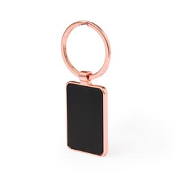 A rose gold keyring with a rectangular, black panel for custom engraving or branding.